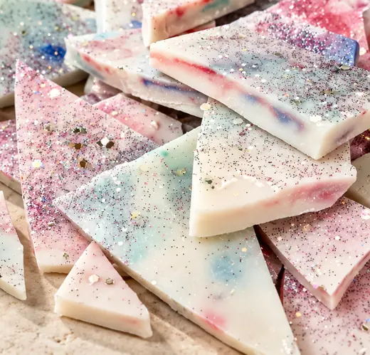 A pile of glittered wax brittle shards